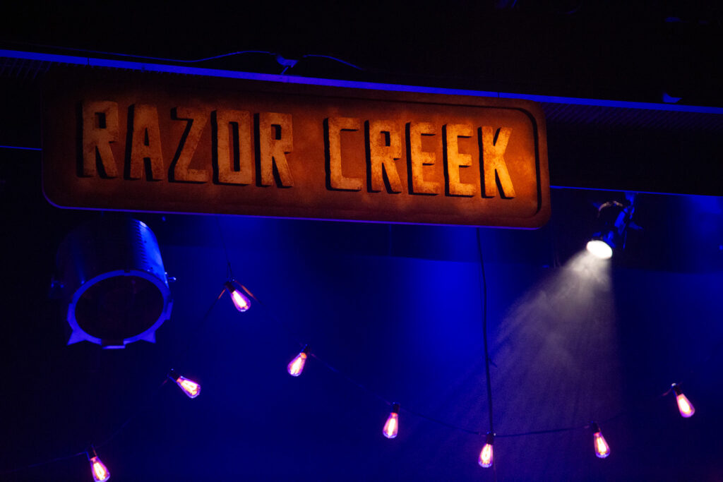 A photo from the production of Razor Creek: Razor Creek: a folk rock sci-fi musical produced at the Iowa New Play Festival at the University of Iowa in Iowa City, Iowa in May, 2024