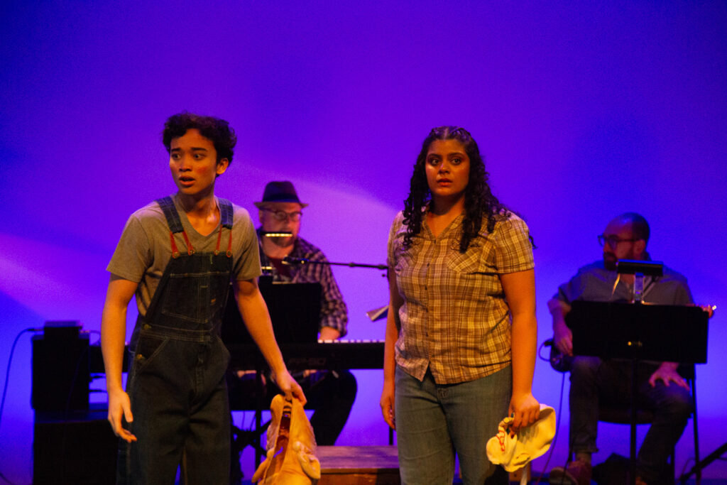 A photo from the production of Razor Creek: Razor Creek: a folk rock sci-fi musical produced at the Iowa New Play Festival at the University of Iowa in Iowa City, Iowa in May, 2024