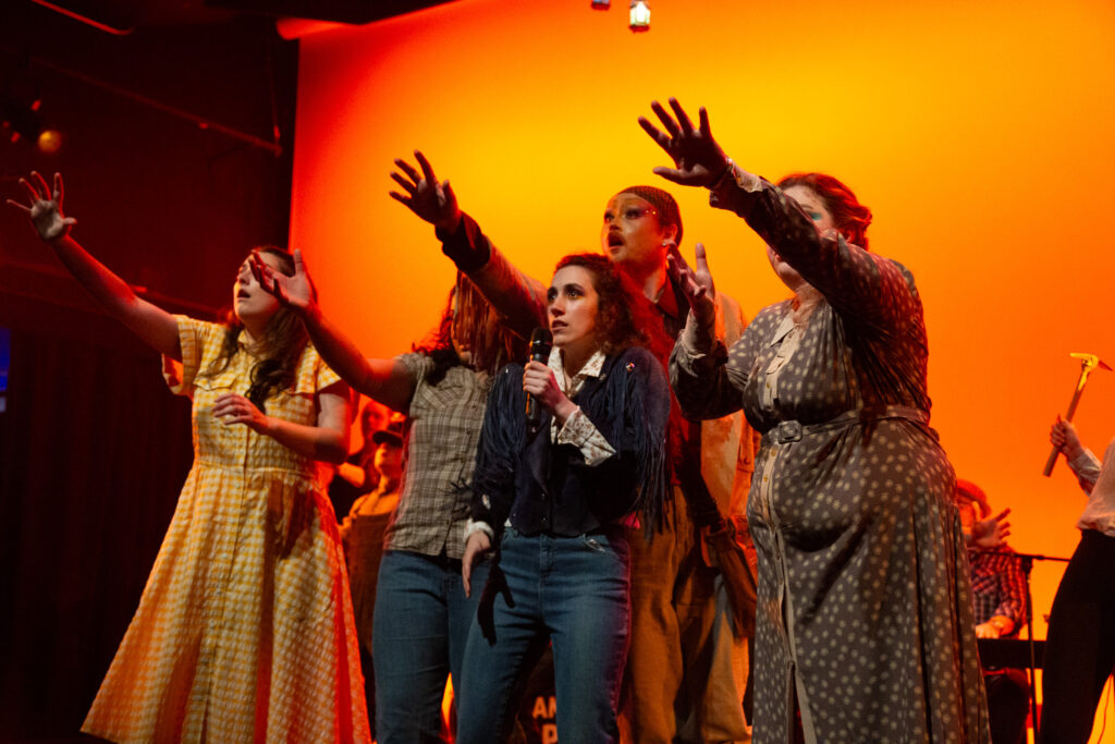 A photo from the production of Razor Creek: Razor Creek: a folk rock sci-fi musical produced at the Iowa New Play Festival at the University of Iowa in Iowa City, Iowa in May, 2024