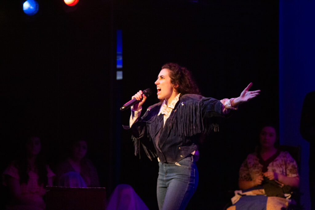 A photo from the production of Razor Creek: Razor Creek: a folk rock sci-fi musical produced at the Iowa New Play Festival at the University of Iowa in Iowa City, Iowa in May, 2024