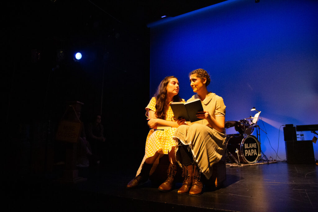 A photo from the production of Razor Creek: Razor Creek: a folk rock sci-fi musical produced at the Iowa New Play Festival at the University of Iowa in Iowa City, Iowa in May, 2024